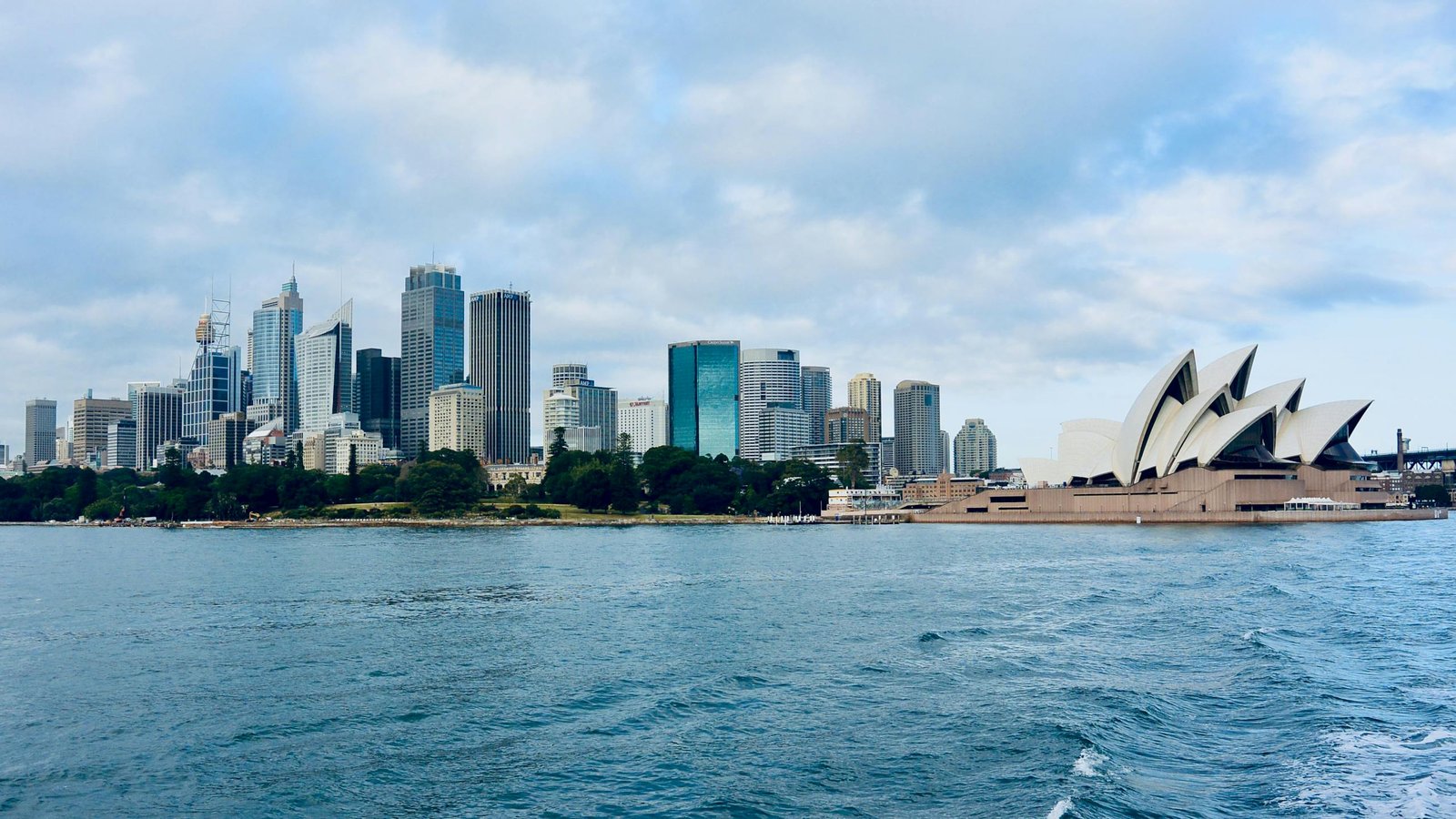 Stunning view of Sydney's skyline with the Opera House, capturing the essence of urban waterfront beauty.